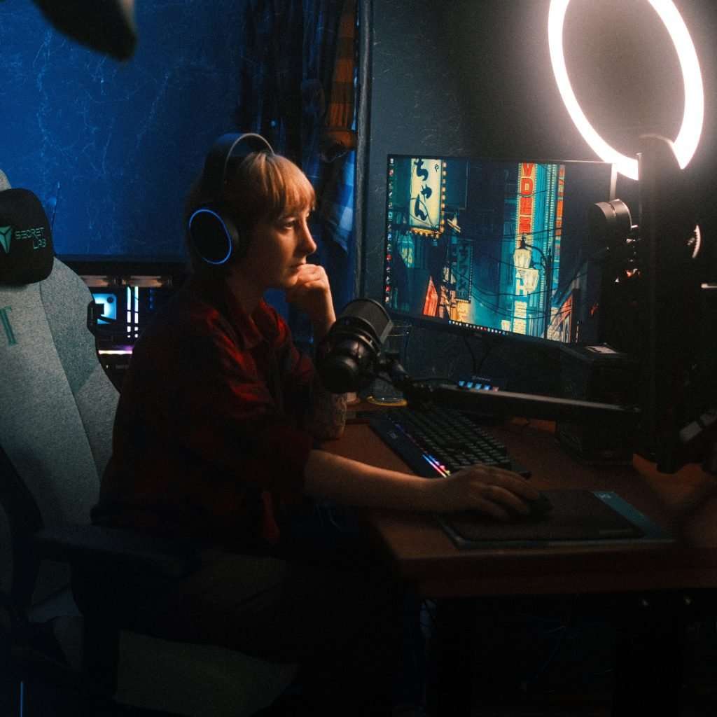 t0ddsquad in front of a computer with a headset on